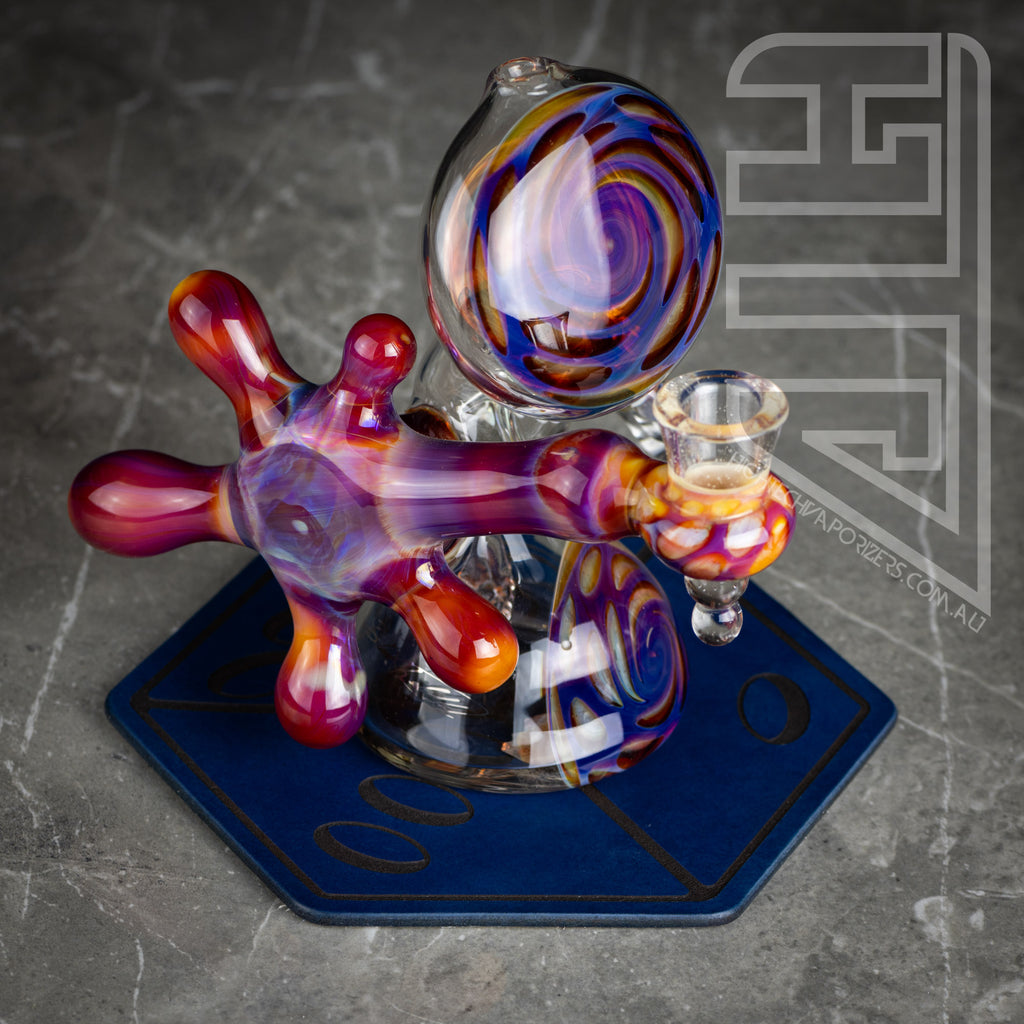 HTV Leather Hexagon Mat blue dice in use with elev8 water pipe