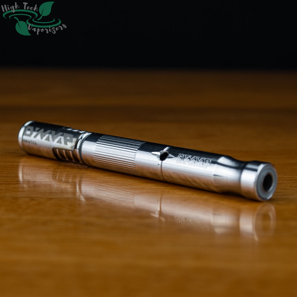 The "M" vaporizer vapcap by dynavap laying on its side